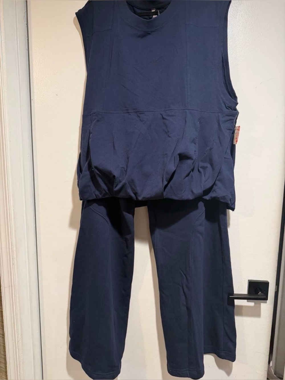 Sleeveless vest and wide leg pants